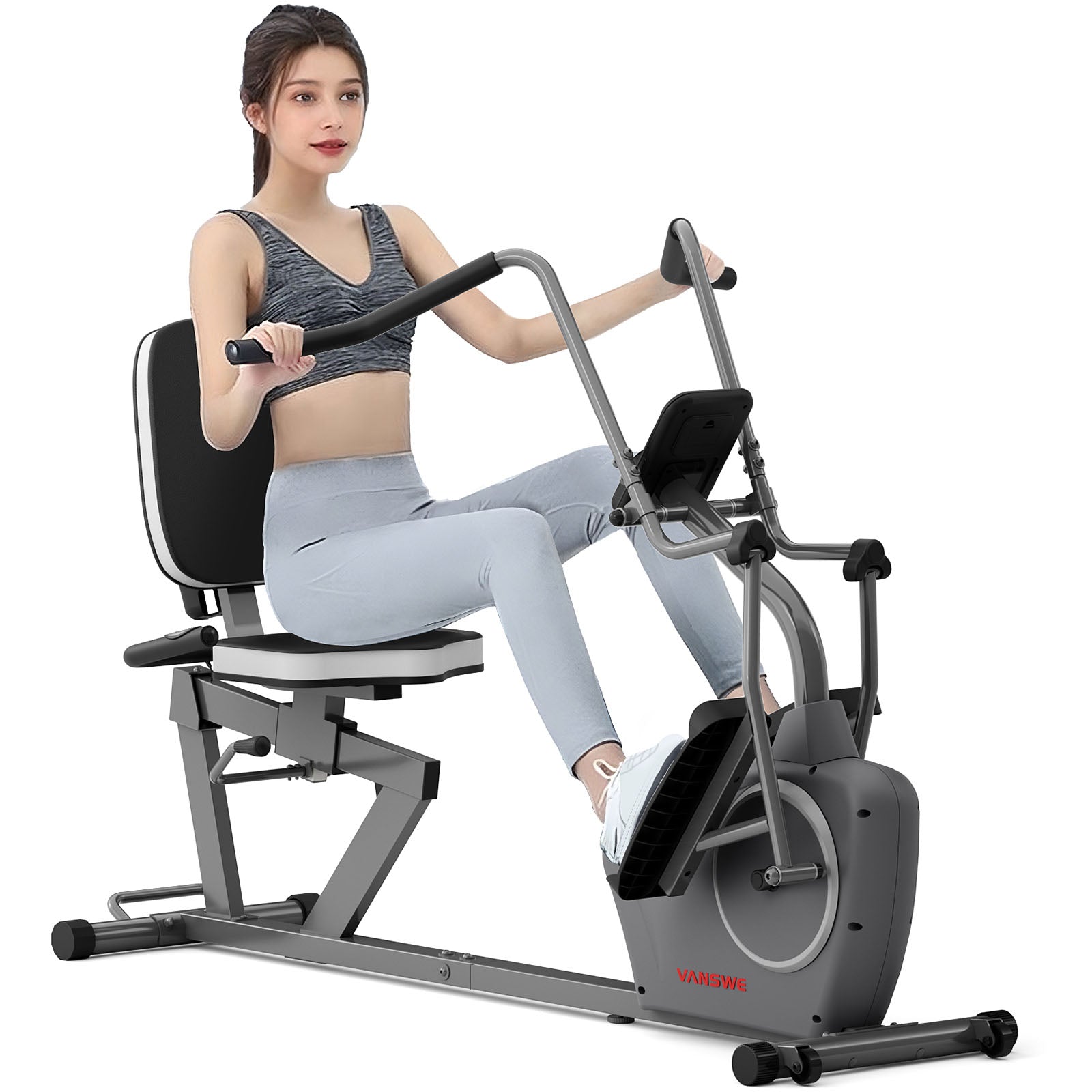 a women is riding on a recumbent bike with arm exerciser